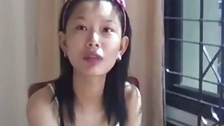 Skinny amateur Asian babe giving head in hotel room